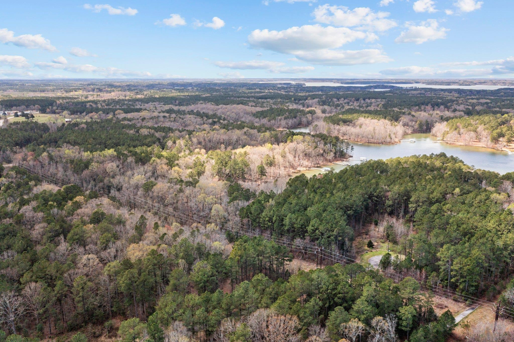 Lot 31 Key Largo Lane Manson, NC 27553 - Photo 16 of 20 a view of a lake with a city