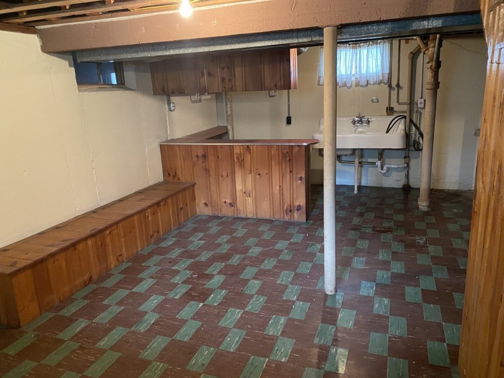 45 Glenellen Road Boston, MA 02132 - Photo 6 of 10 a view of a hallway with wooden door