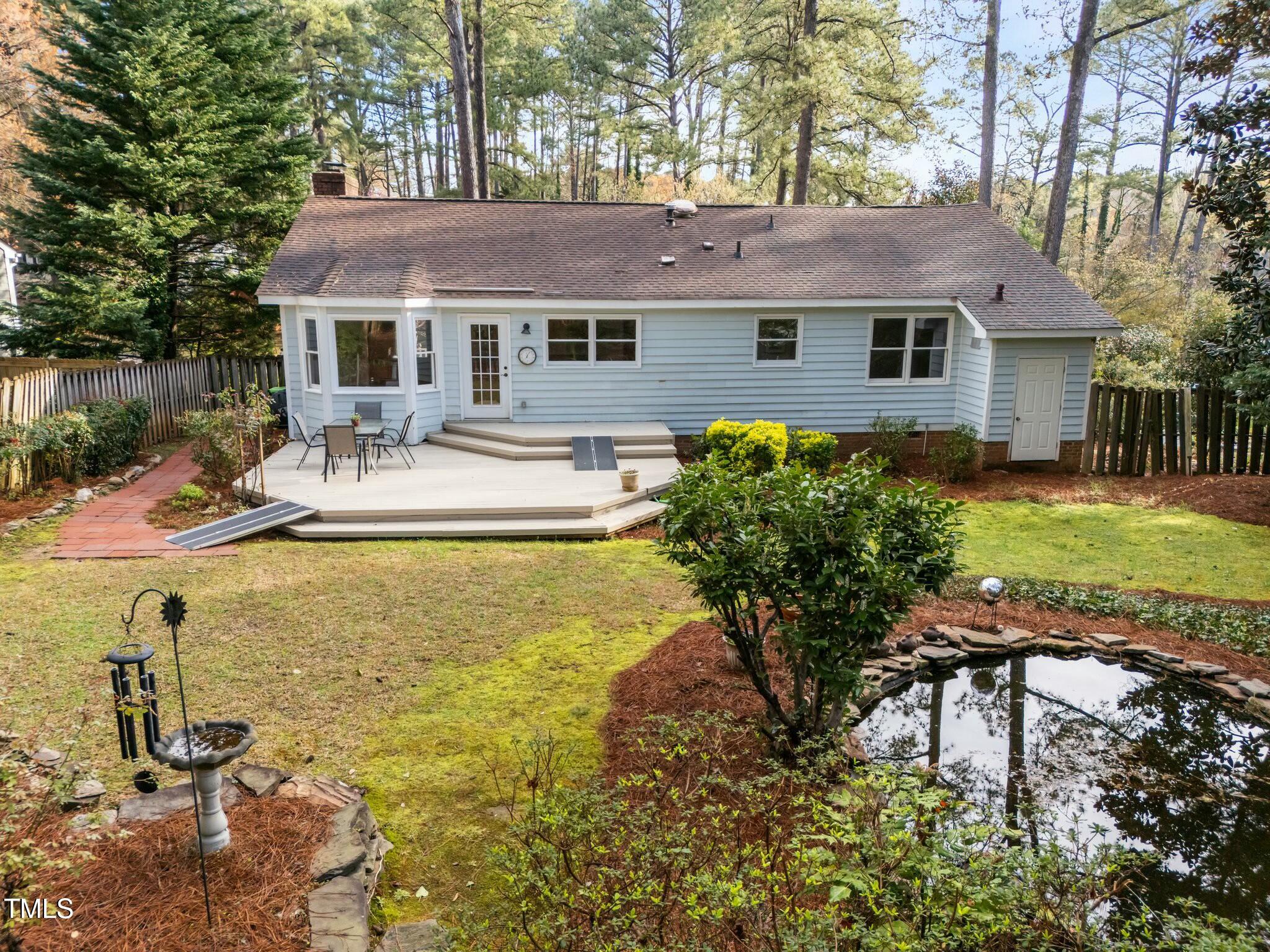 5809 Heatherbrook Circle Raleigh, NC 27612 - Photo 37 of 42 View of back of home from the backyard.