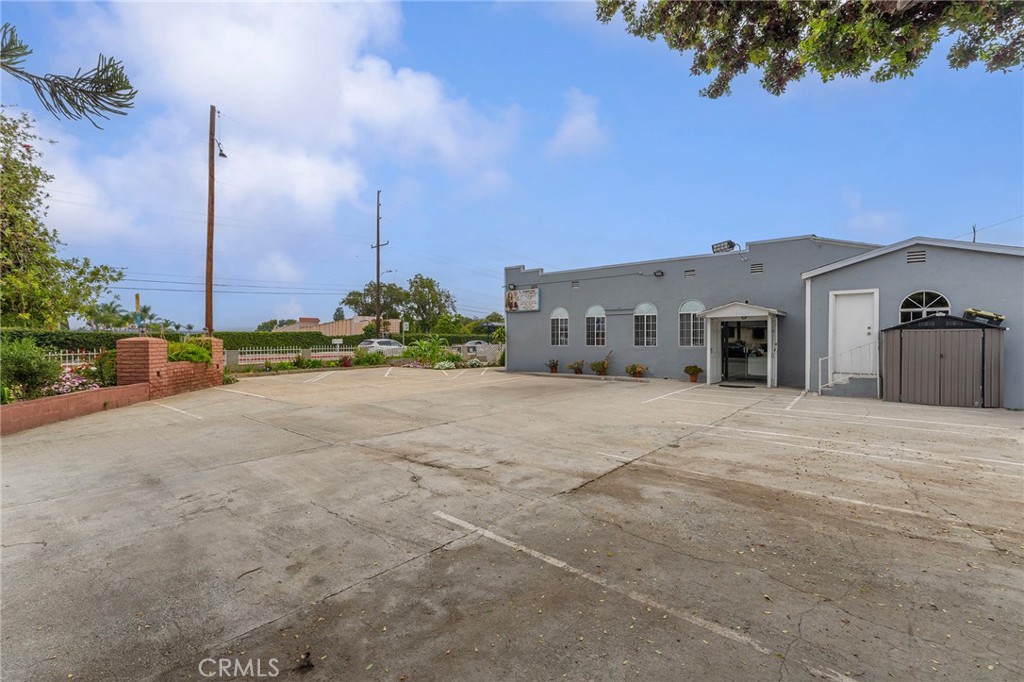 6408 Perry Road Bell Gardens, CA 90201 - Photo 12 of 32 a view of a house with a outdoor space and window