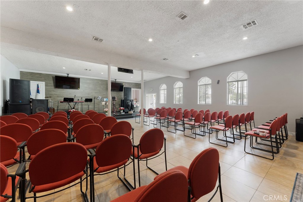 6408 Perry Road Bell Gardens, CA 90201 - Photo 17 of 32 a very nice looking living room with dining room and furniture