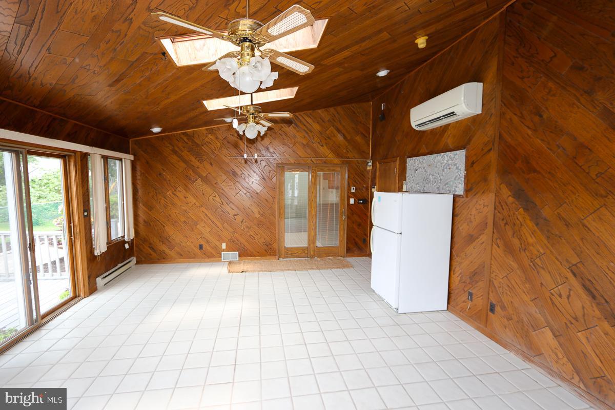2068 Clinton Road Huntingdon Valley, PA 19006 - Photo 24 of 65 Wood walls, ceiling and tile floors