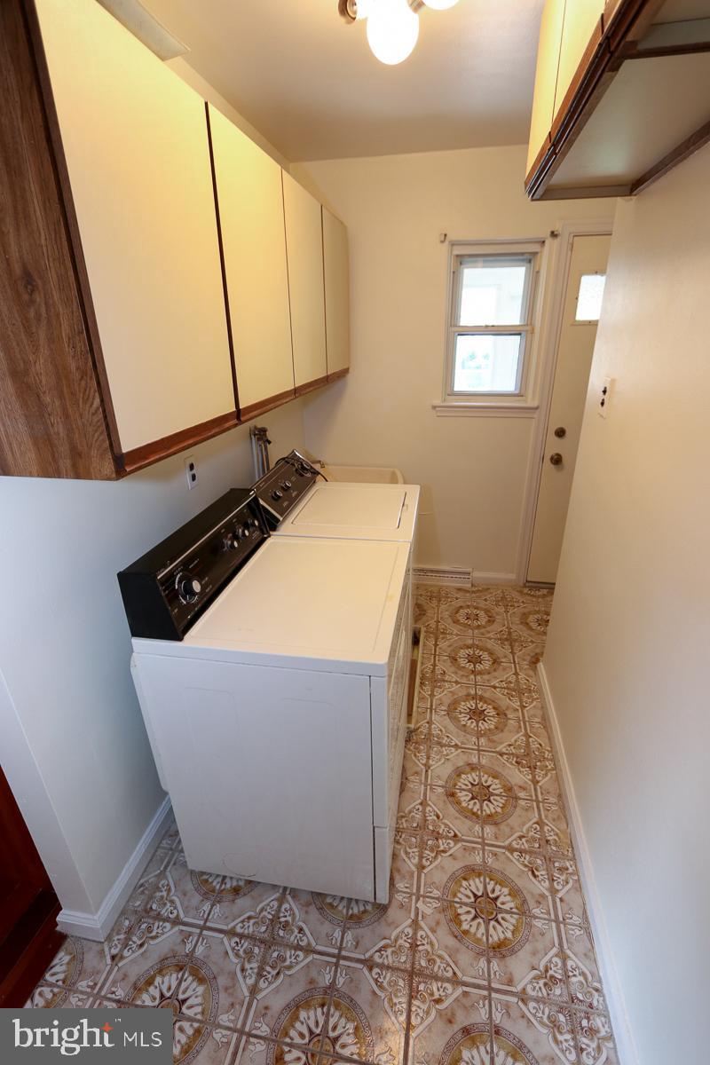 2068 Clinton Road Huntingdon Valley, PA 19006 - Photo 28 of 65 Laundry room with storage