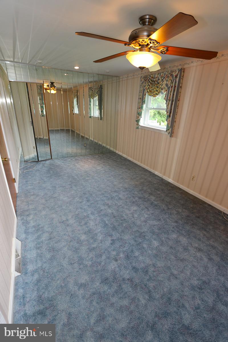 2068 Clinton Road Huntingdon Valley, PA 19006 - Photo 31 of 65 Primary bedroom with ceiling fan