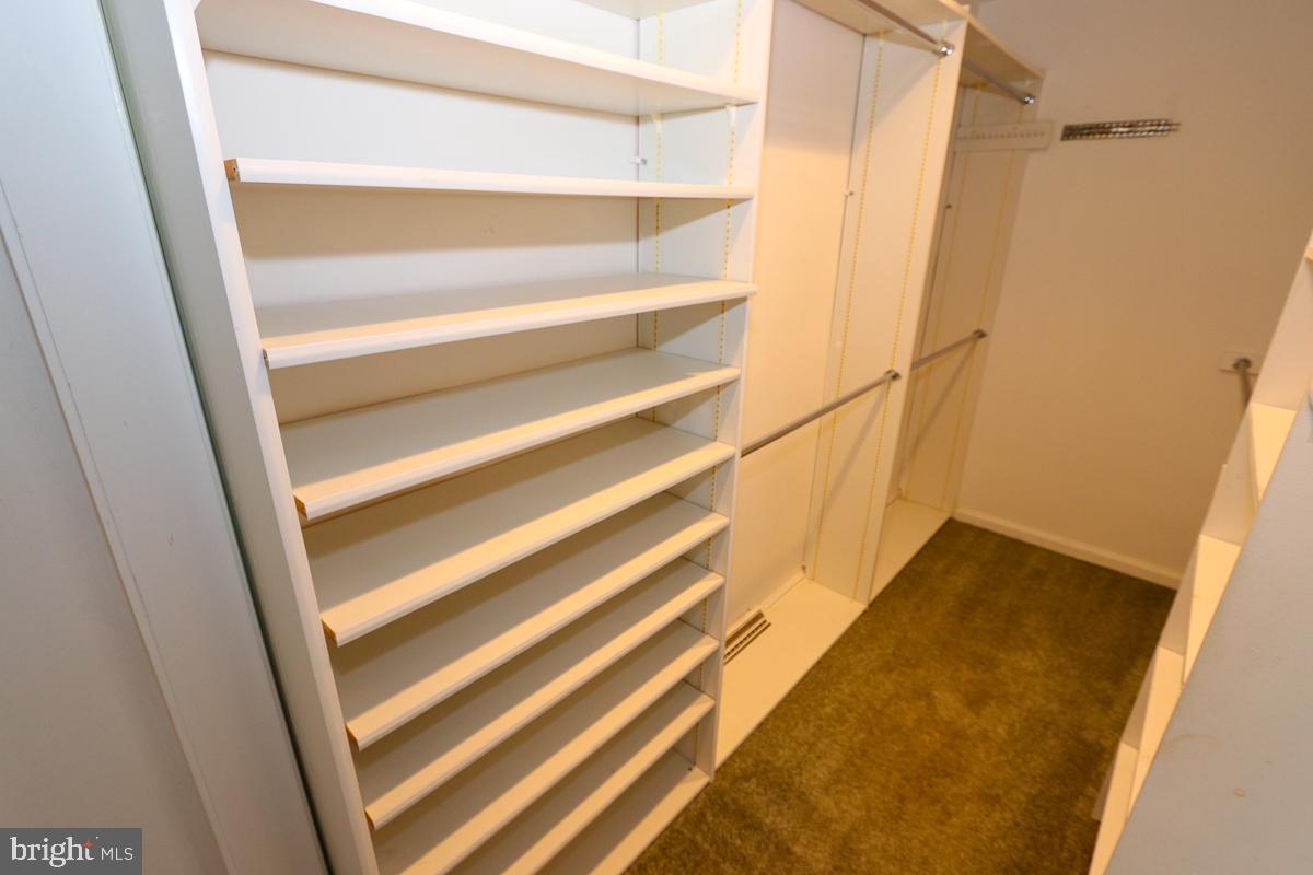 2068 Clinton Road Huntingdon Valley, PA 19006 - Photo 44 of 65 Primary bedroom closet with shelving