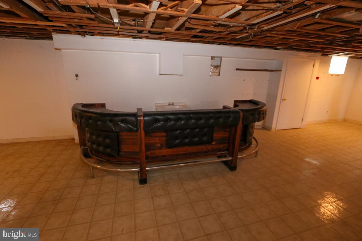 2068 Clinton Road Huntingdon Valley, PA 19006 - Photo 48 of 65 Basement bar area with sink