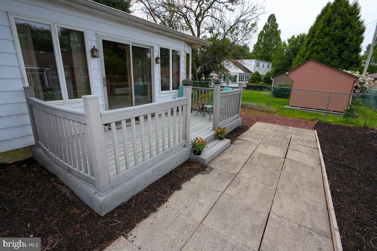 2068 Clinton Road Huntingdon Valley, PA 19006 - Photo 58 of 65 Rear deck with sliders to Sun Room