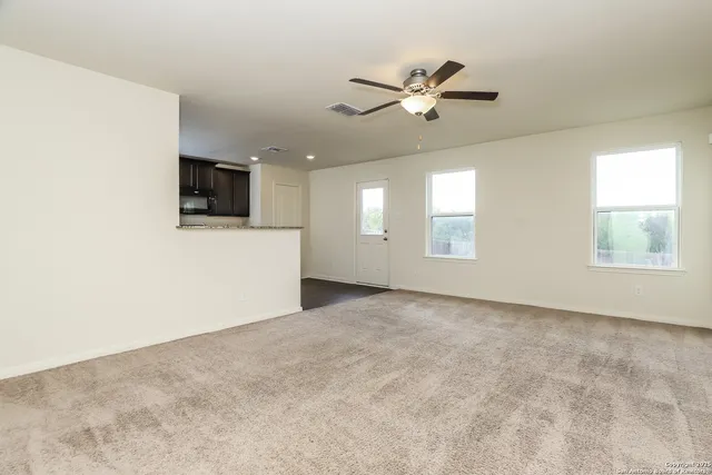 a view of a livingroom with a flat screen tv