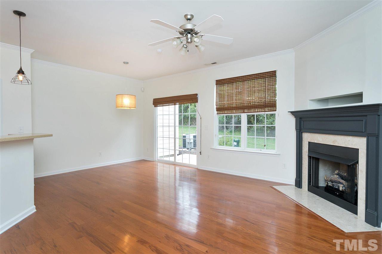 369 Red Elm Drive Durham, NC 27713 - Photo 2 of 29 a view of an empty room with window and fire place