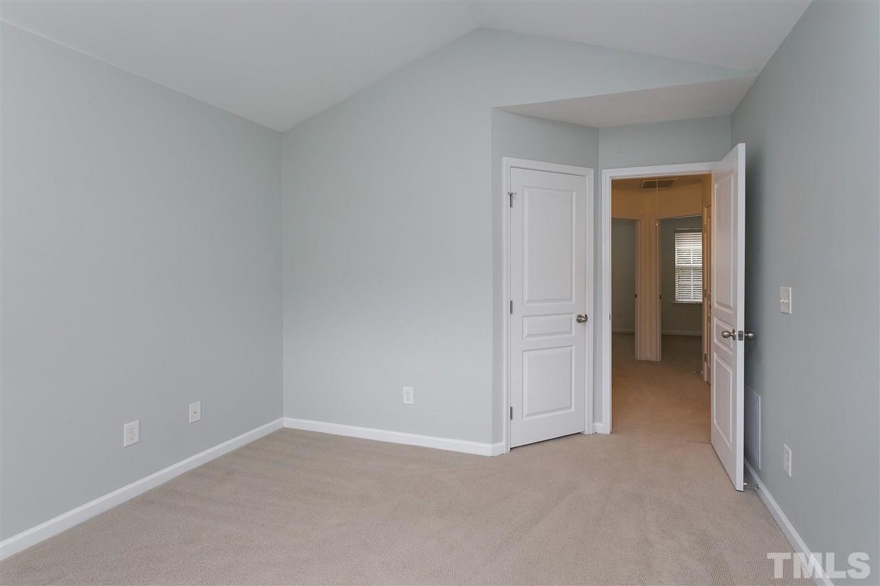 369 Red Elm Drive Durham, NC 27713 - Photo 16 of 29 a view of an empty room and closet