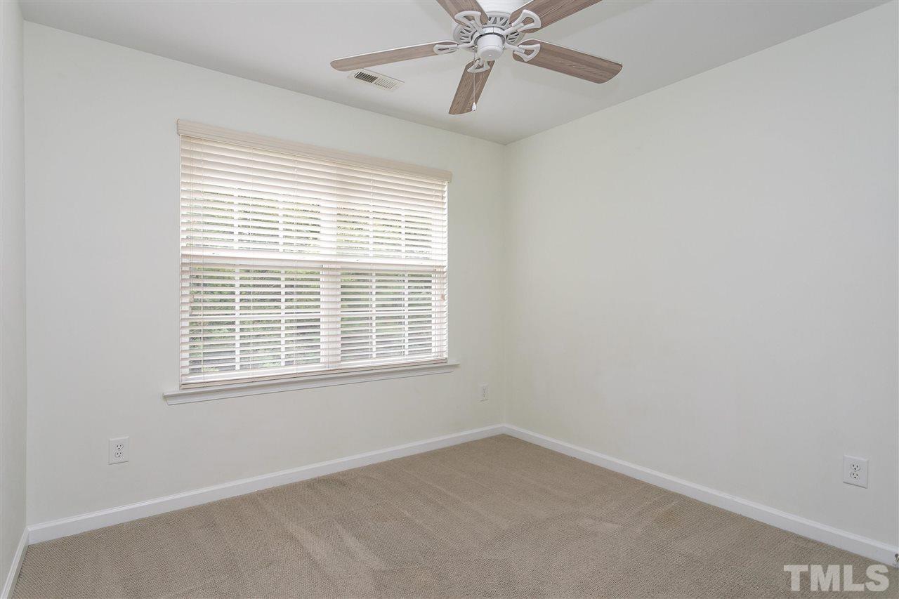 369 Red Elm Drive Durham, NC 27713 - Photo 19 of 29 a view of an empty room with a window