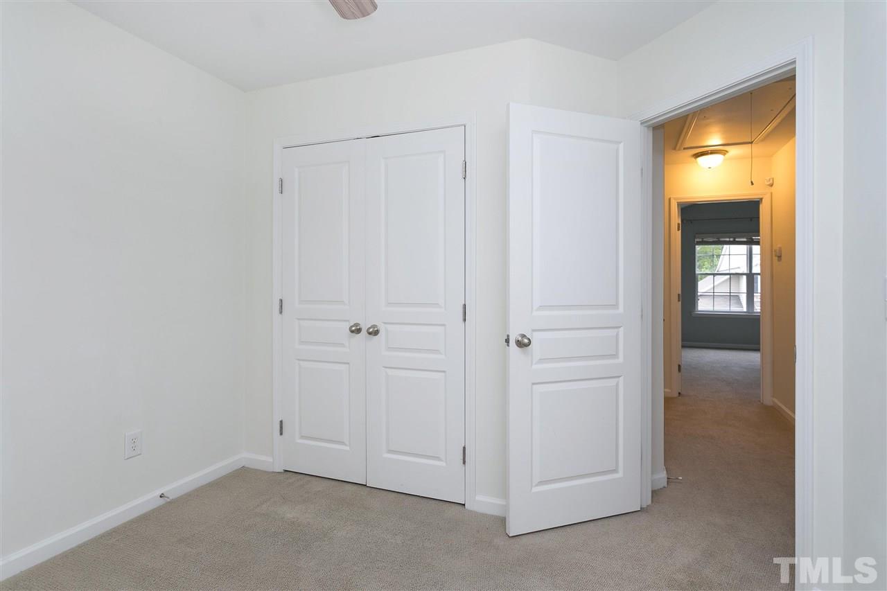 369 Red Elm Drive Durham, NC 27713 - Photo 20 of 29 an empty room with windows and closet
