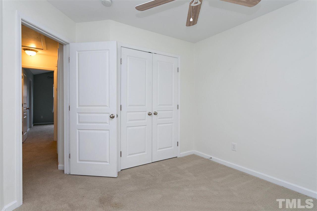 369 Red Elm Drive Durham, NC 27713 - Photo 21 of 29 an empty room with windows and closet