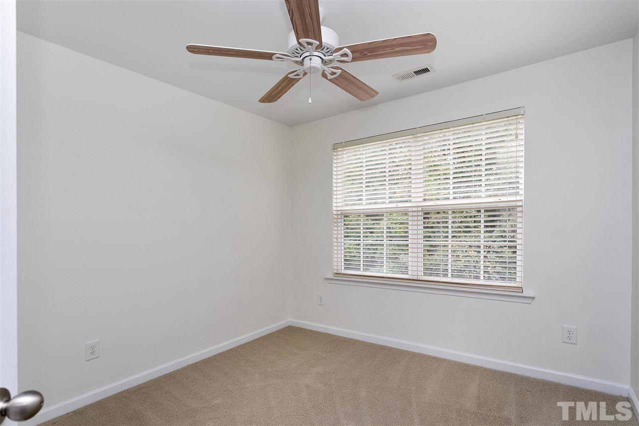 369 Red Elm Drive Durham, NC 27713 - Photo 22 of 29 a view of an empty room with a window