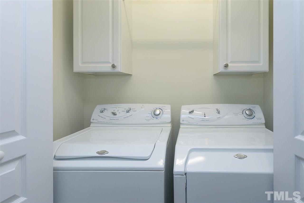 369 Red Elm Drive Durham, NC 27713 - Photo 25 of 29 a utility room with dryer and washer