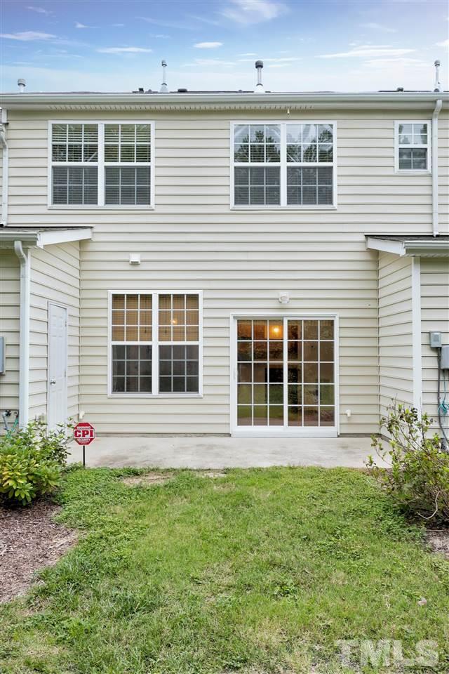 369 Red Elm Drive Durham, NC 27713 - Photo 28 of 29 a front view of a house with a garden
