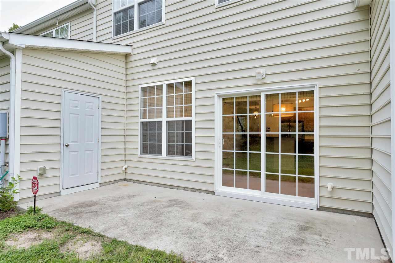 369 Red Elm Drive Durham, NC 27713 - Photo 29 of 29 a view of a house with a window and a yard