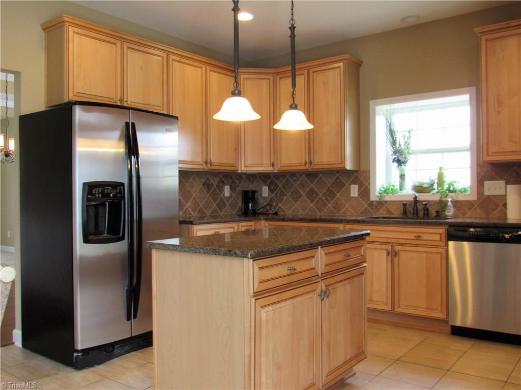 4604 River Valley Road High Point, NC 27265 - Photo 2 of 20 Every cook will enjoy preparing a meal in this kitchen. Functional layout with center island that gives you plenty of work space.