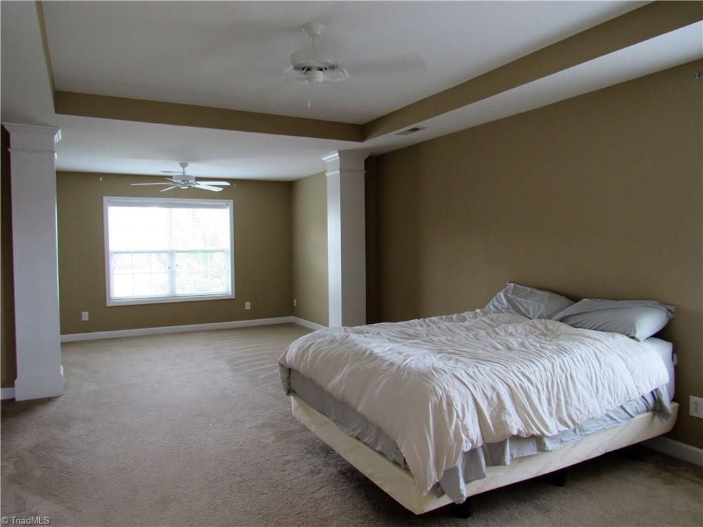 4604 River Valley Road High Point, NC 27265 - Photo 11 of 20 The master bedroom is large with it's own sitting area.