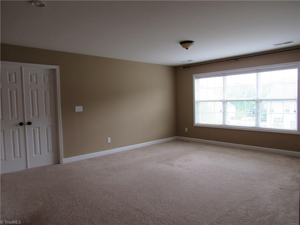 4604 River Valley Road High Point, NC 27265 - Photo 12 of 20 Upstairs family room provides space for the kids to hang out.