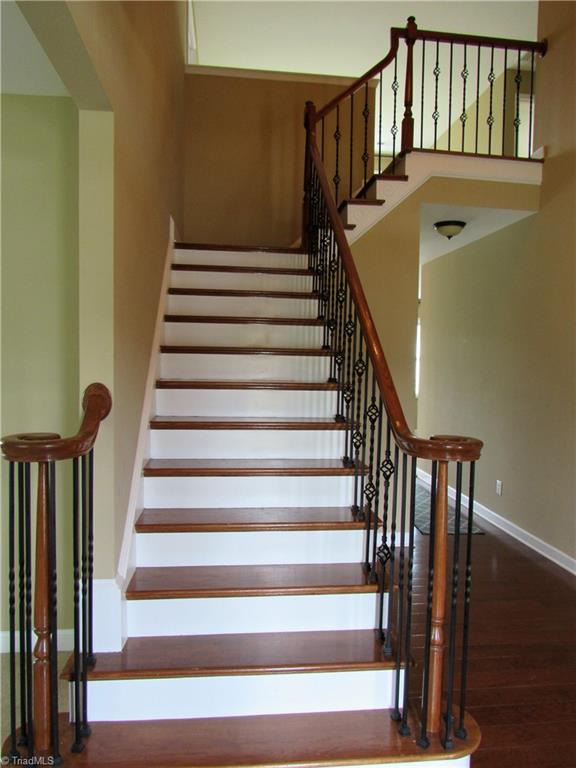 4604 River Valley Road High Point, NC 27265 - Photo 9 of 20 Stairs lead up to a large upstairs family room.