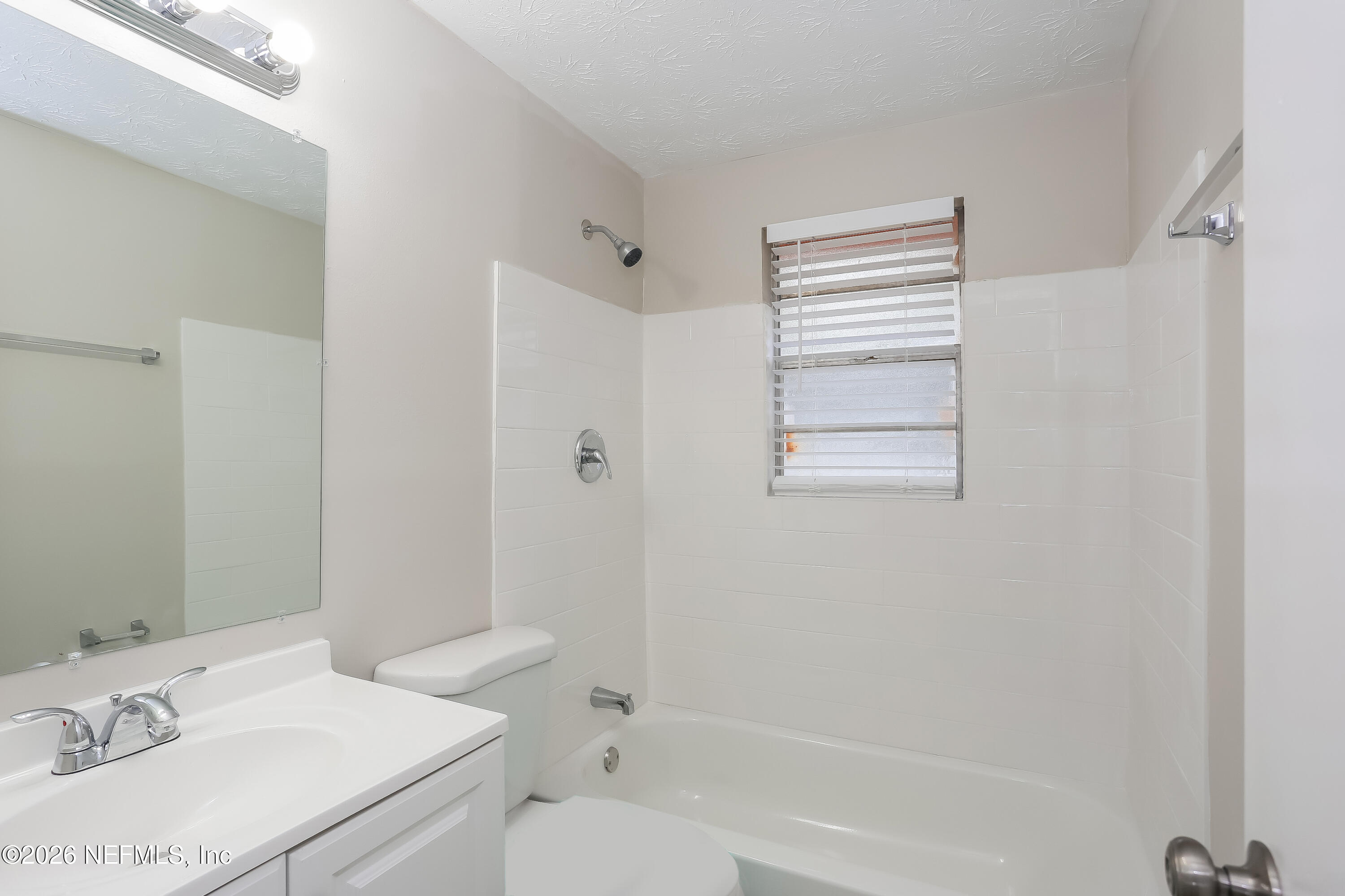 9572 Spottswood Road West Jacksonville, FL 32208 - Photo 13 of 16 013-photo-bathroom-10044554