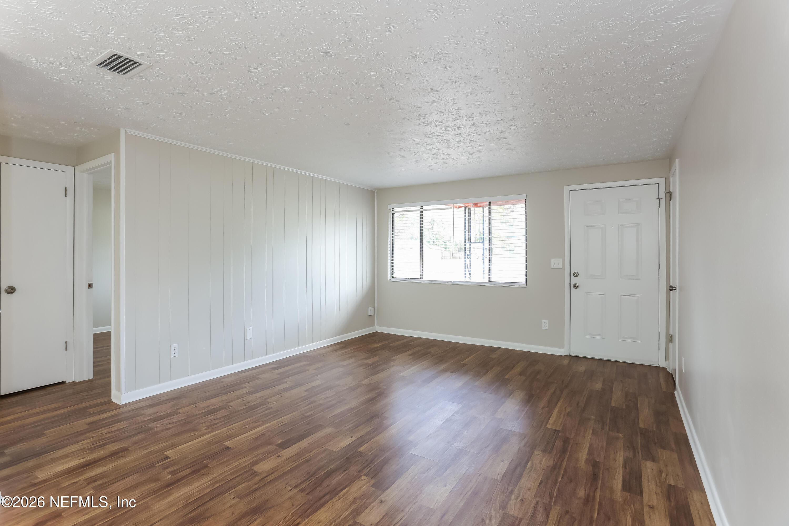 9572 Spottswood Road West Jacksonville, FL 32208 - Photo 2 of 16 002-photo-living-room-10044543