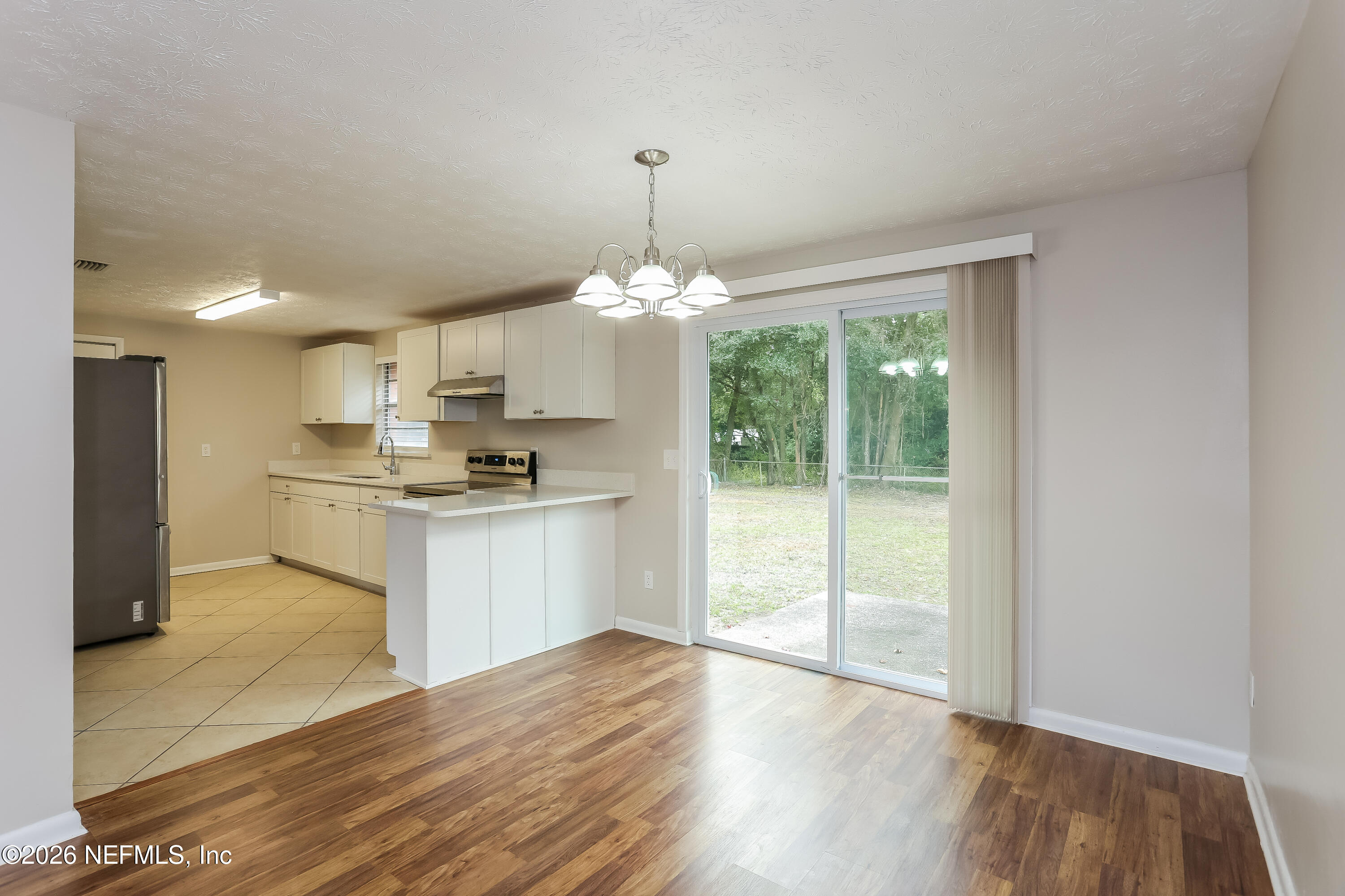 9572 Spottswood Road West Jacksonville, FL 32208 - Photo 5 of 16 005-photo-dining-room-10044546