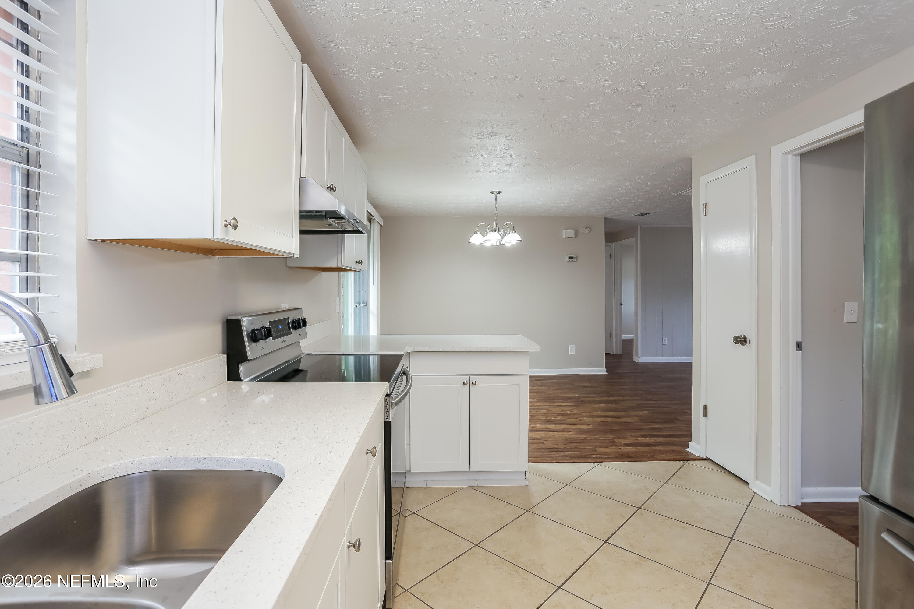 9572 Spottswood Road West Jacksonville, FL 32208 - Photo 7 of 16 007-photo-kitchen-10044548