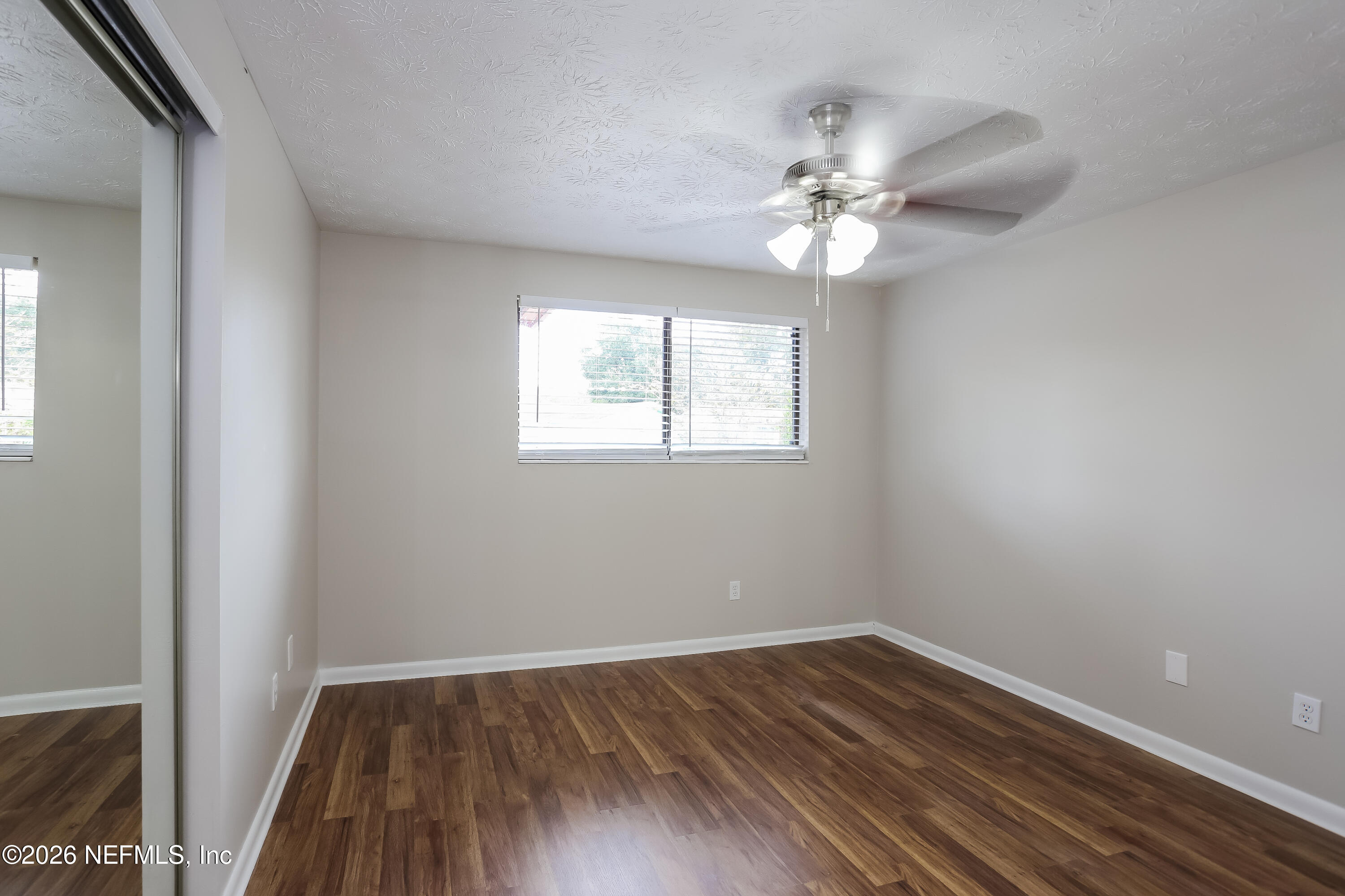 9572 Spottswood Road West Jacksonville, FL 32208 - Photo 8 of 16 008-photo-primary-bedroom-10044549