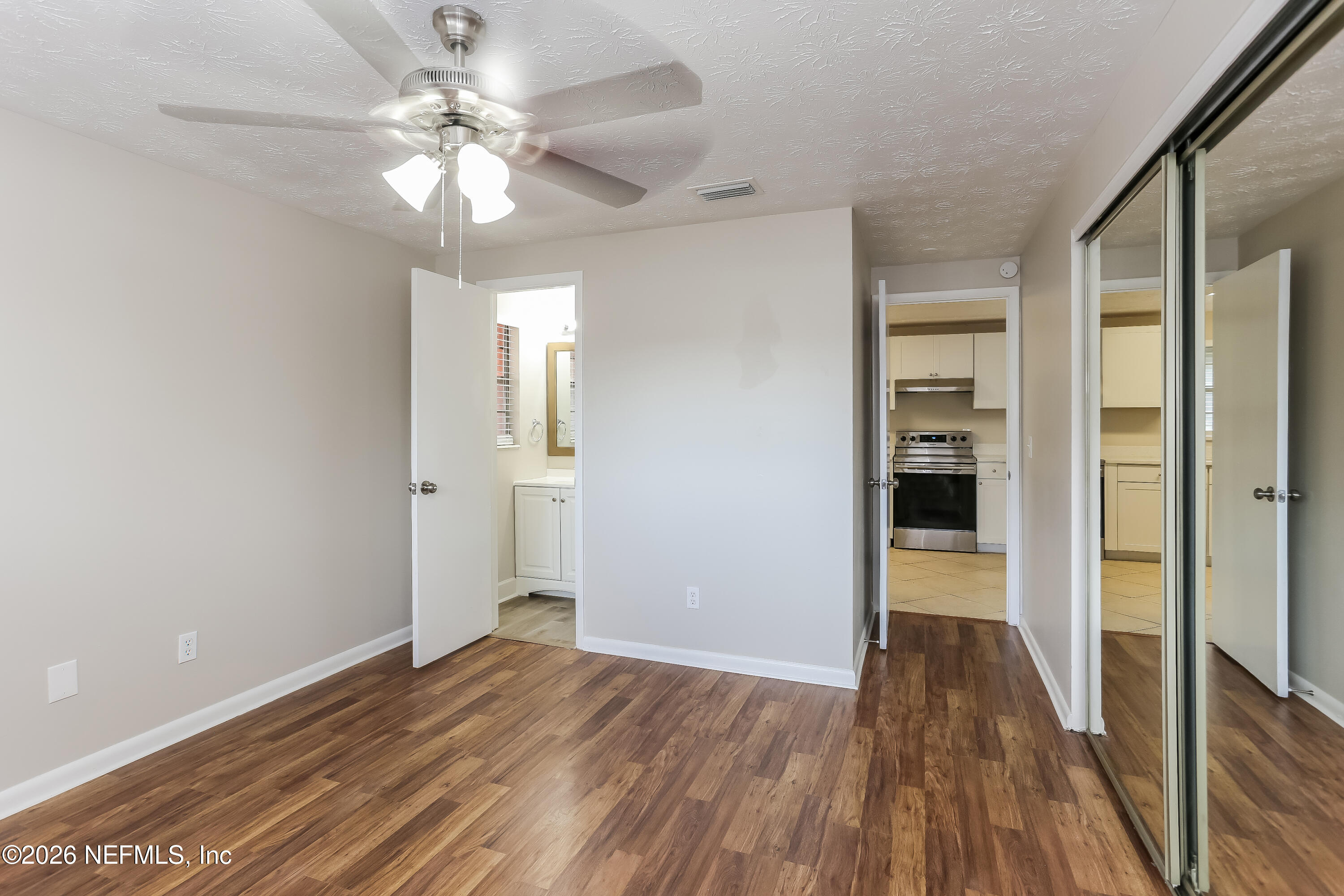 9572 Spottswood Road West Jacksonville, FL 32208 - Photo 9 of 16 009-photo-primary-bedroom-10044550