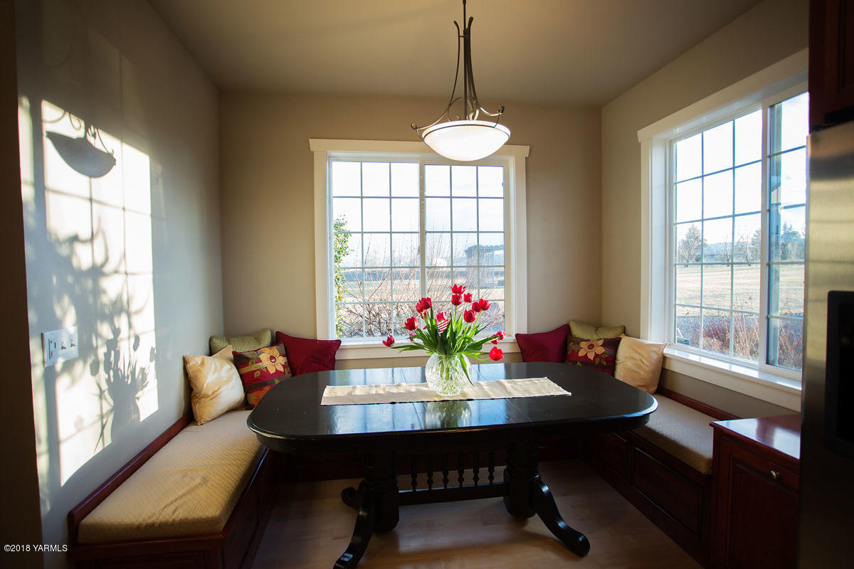 14750 Fisk Road Yakima, WA 98908 - Photo 15 of 35 a view of a dining room with furniture window and outside view
