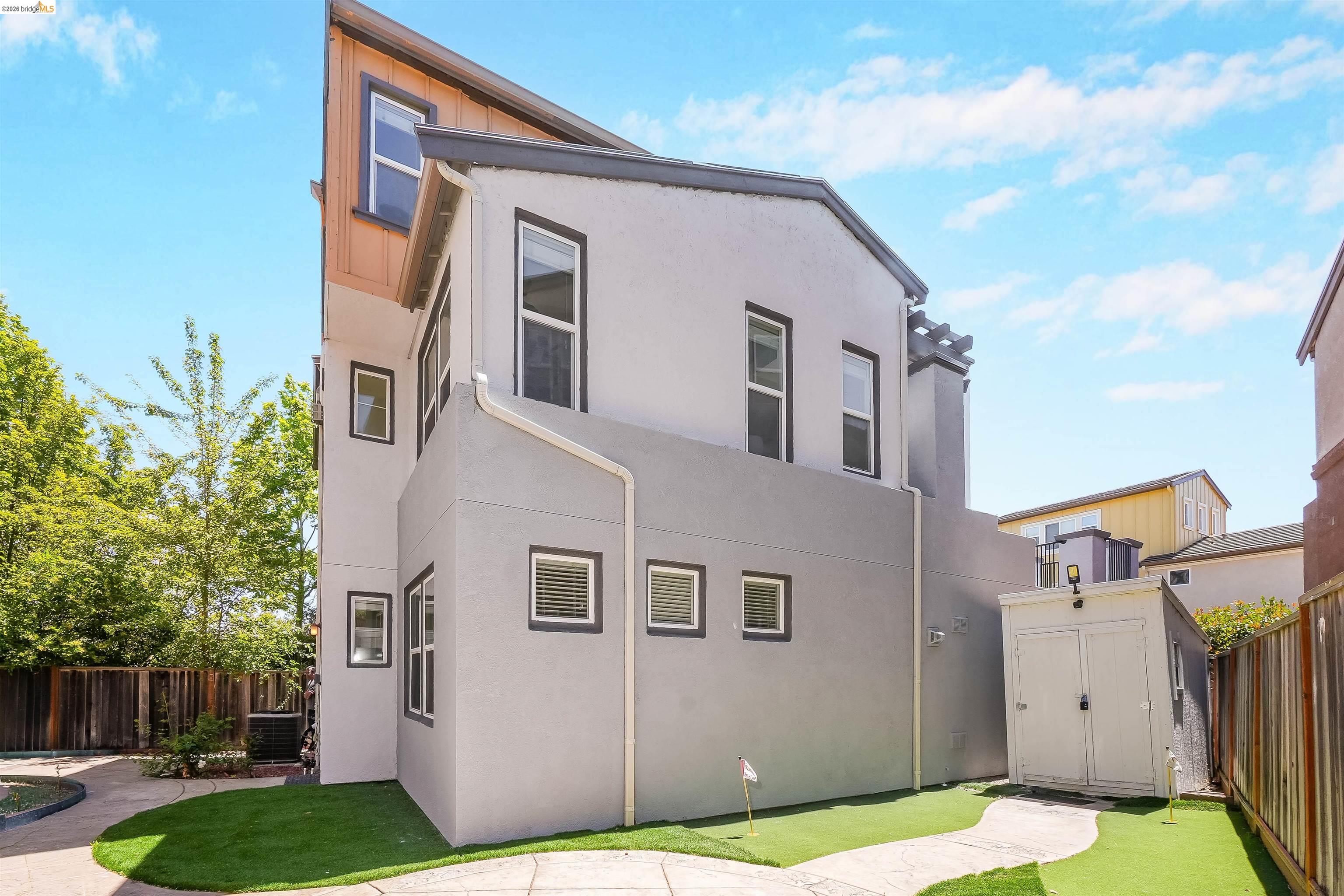 449 Constantine Court San Ramon, CA 94583 - Photo 58 of 63 Modern multi-story exterior with light gray stucco and dark trim accents