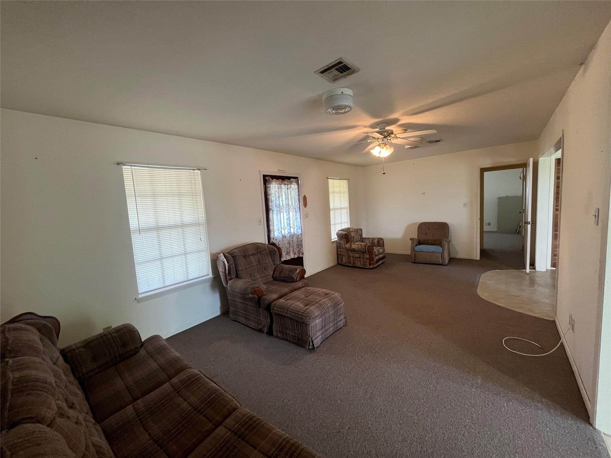 1475 Cr 16 Road Garwood, TX 77442 - Photo 26 of 43 a living room with furniture and a ceiling fan