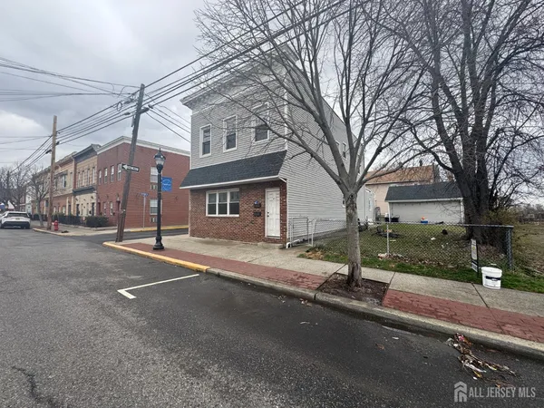 a front view of a building with street view