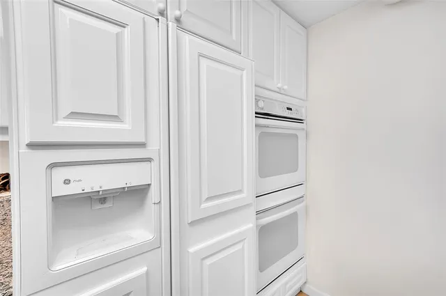 a view of an empty room with a sliding door