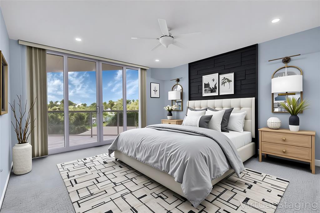 6001 North Ocean Drive, Unit 403 Hollywood, FL 33019 - Photo 15 of 58 a bedroom with a large bed and a large window