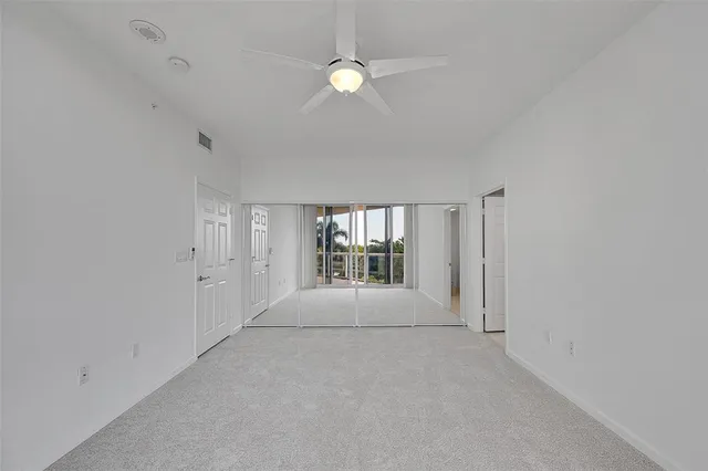a bathroom with a sink vanity and mirror