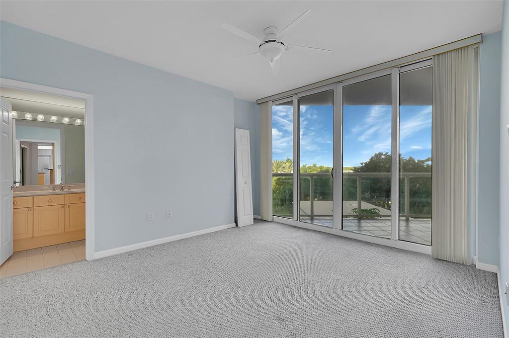 6001 North Ocean Drive, Unit 403 Hollywood, FL 33019 - Photo 24 of 58 a view of room with window and ceiling fan