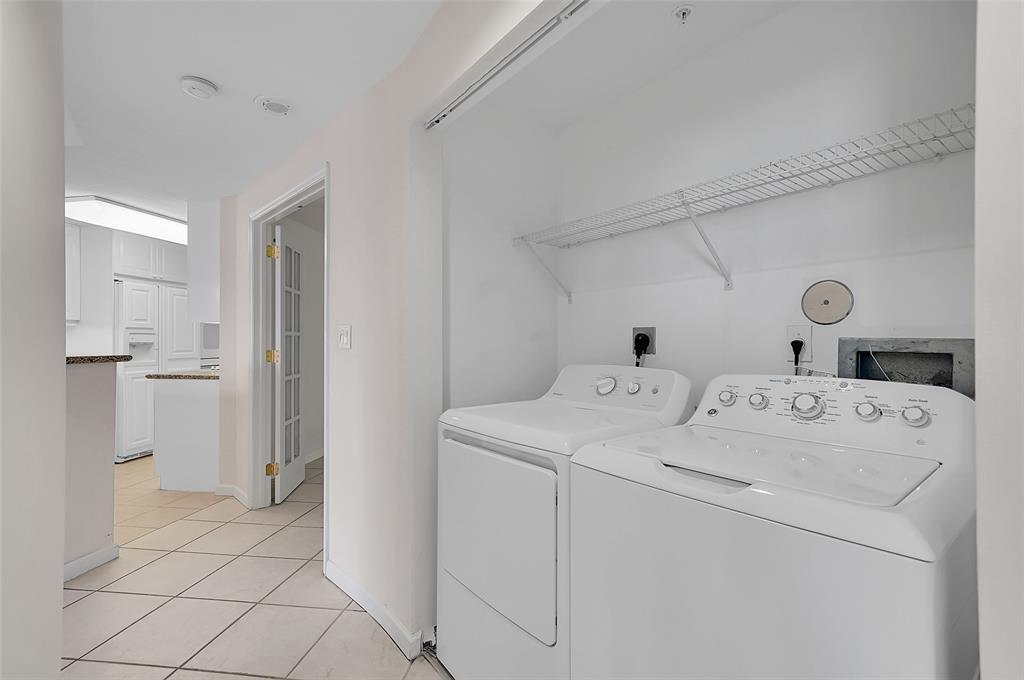 6001 North Ocean Drive, Unit 403 Hollywood, FL 33019 - Photo 29 of 58 a utility room with dryer and washer