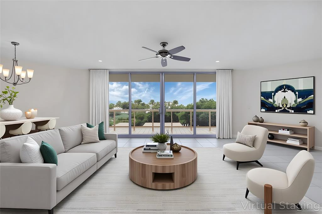 6001 North Ocean Drive, Unit 403 Hollywood, FL 33019 - Photo 3 of 58 a living room with furniture and a large window