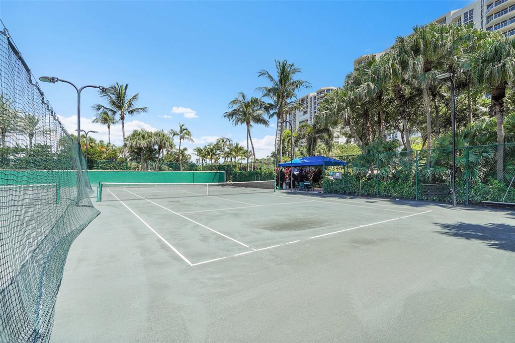 6001 North Ocean Drive, Unit 403 Hollywood, FL 33019 - Photo 45 of 58 a view of a tennis court