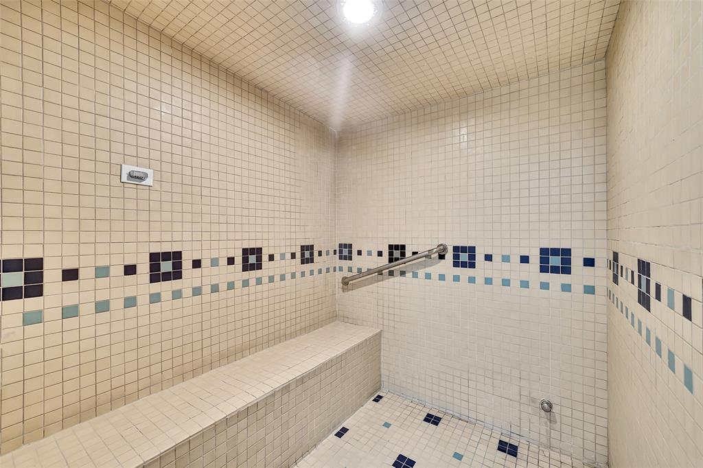 6001 North Ocean Drive, Unit 403 Hollywood, FL 33019 - Photo 49 of 58 a bathroom with a bathtub and a shower