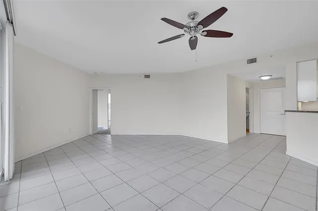 a view of a kitchen with a sink