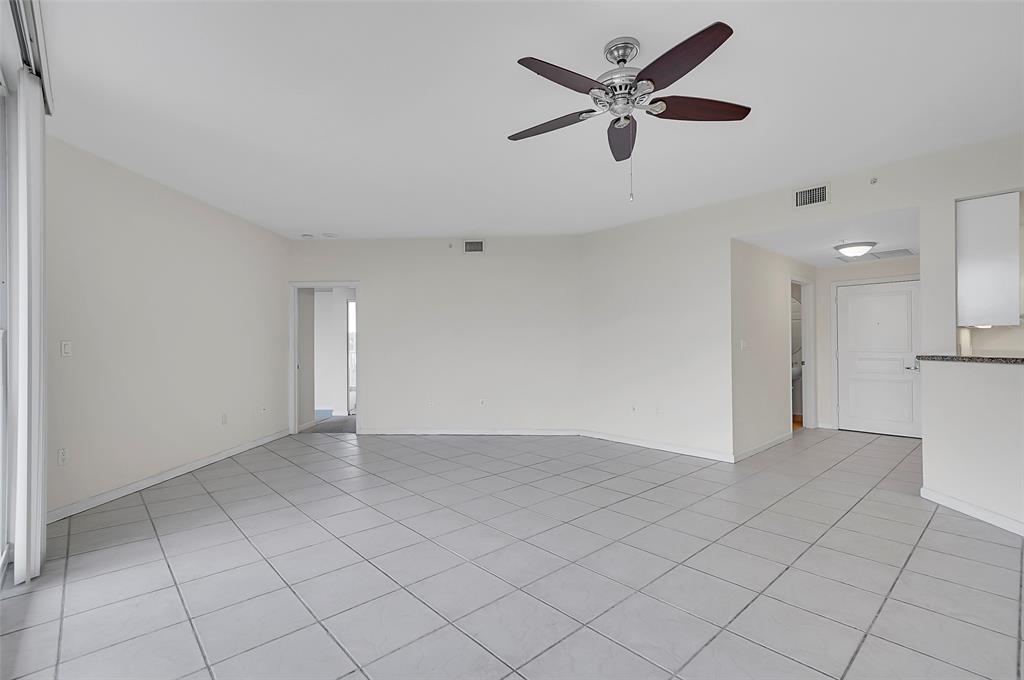 6001 North Ocean Drive, Unit 403 Hollywood, FL 33019 - Photo 7 of 58 an empty room with closet and windows