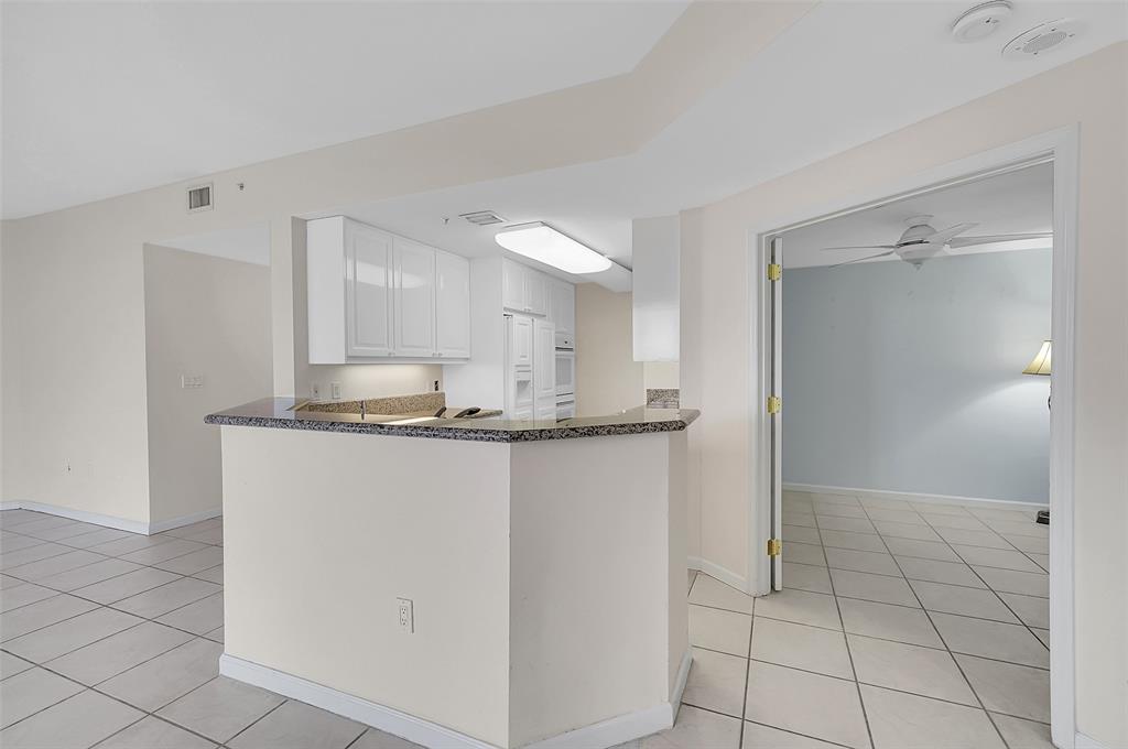 6001 North Ocean Drive, Unit 403 Hollywood, FL 33019 - Photo 9 of 58 a bathroom with a sink and a mirror