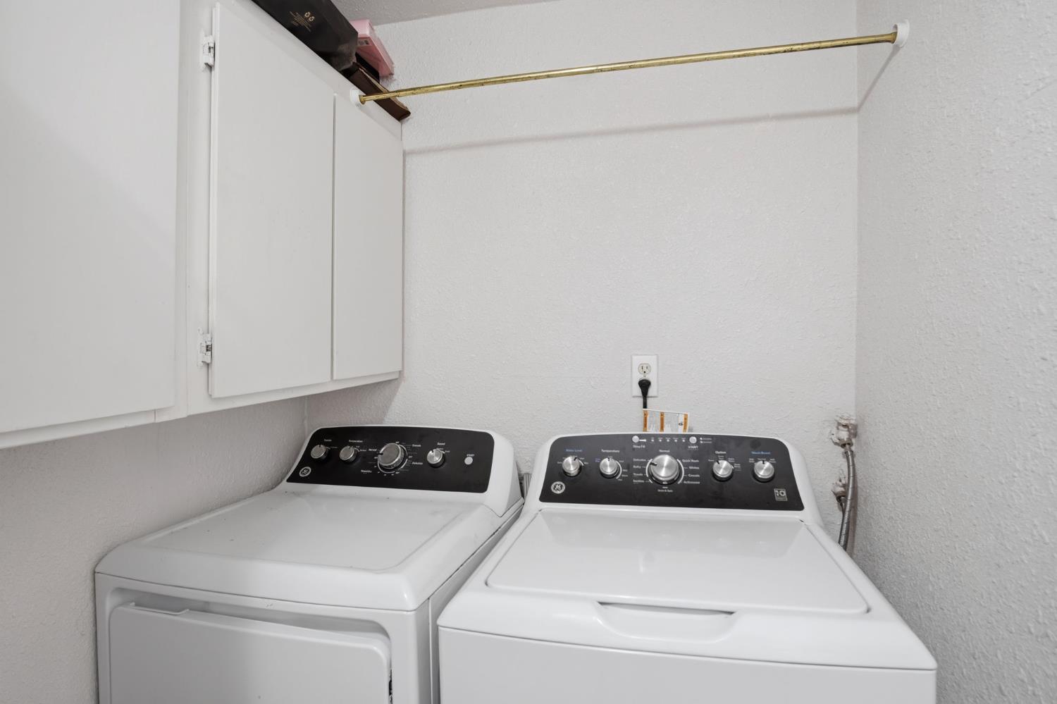 6176 Fleming Road Atwater, CA 95301 - Photo 22 of 41 a close view of utility room with washer and dryer