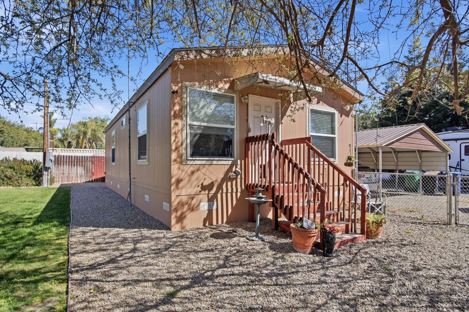 6176 Fleming Road Atwater, CA 95301 - Photo 5 of 41 a view of a house with a yard