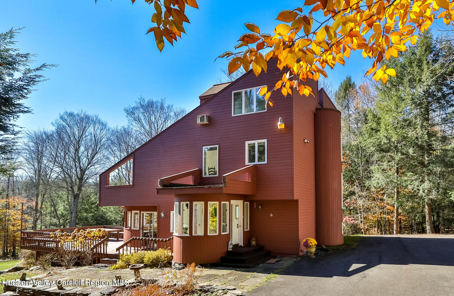 91 Beaver Hill Road Windham, NY 12496 - Photo 2 of 35 a front view of a house with a yard