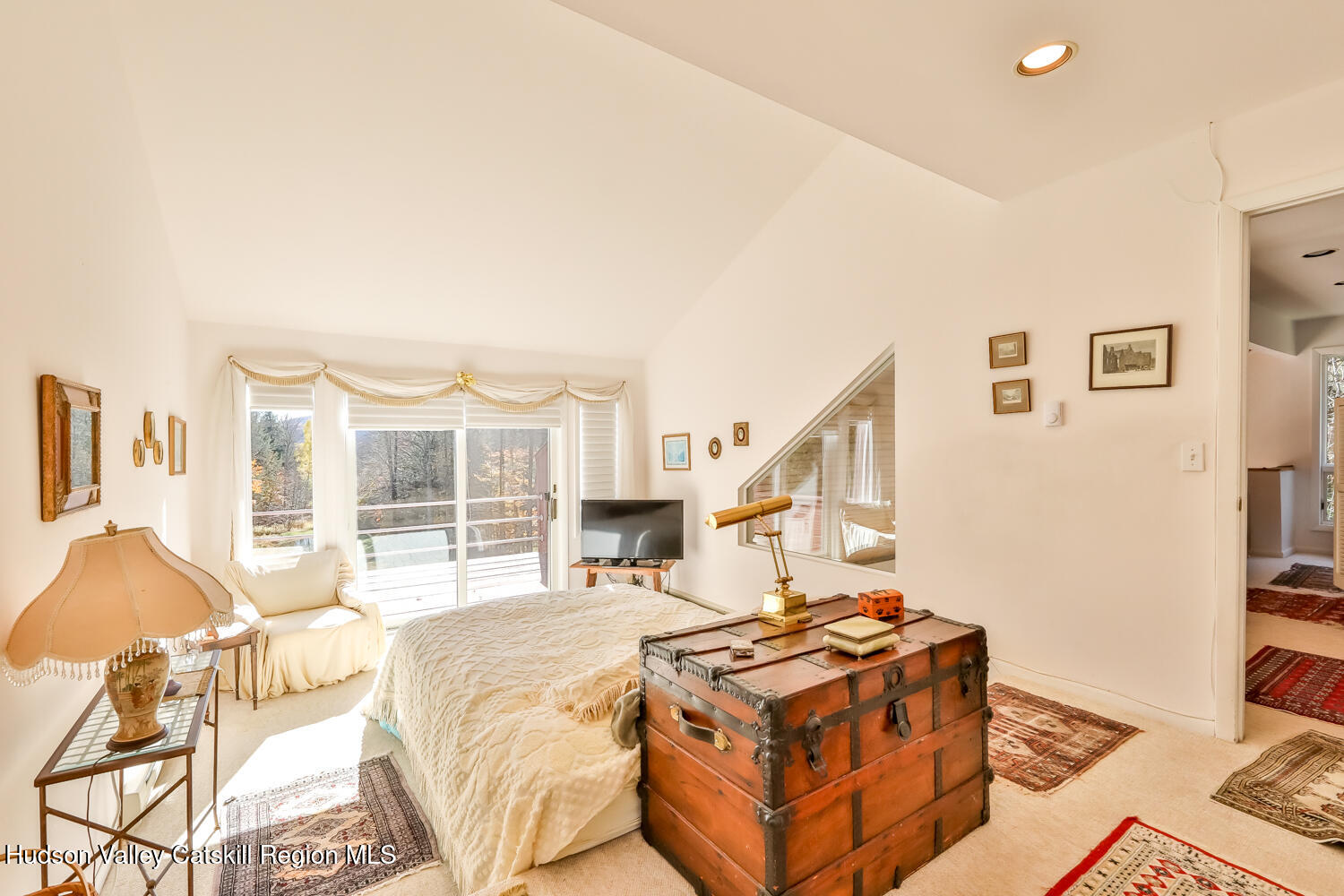 91 Beaver Hill Road Windham, NY 12496 - Photo 22 of 35 a bed room with a bed and a chair